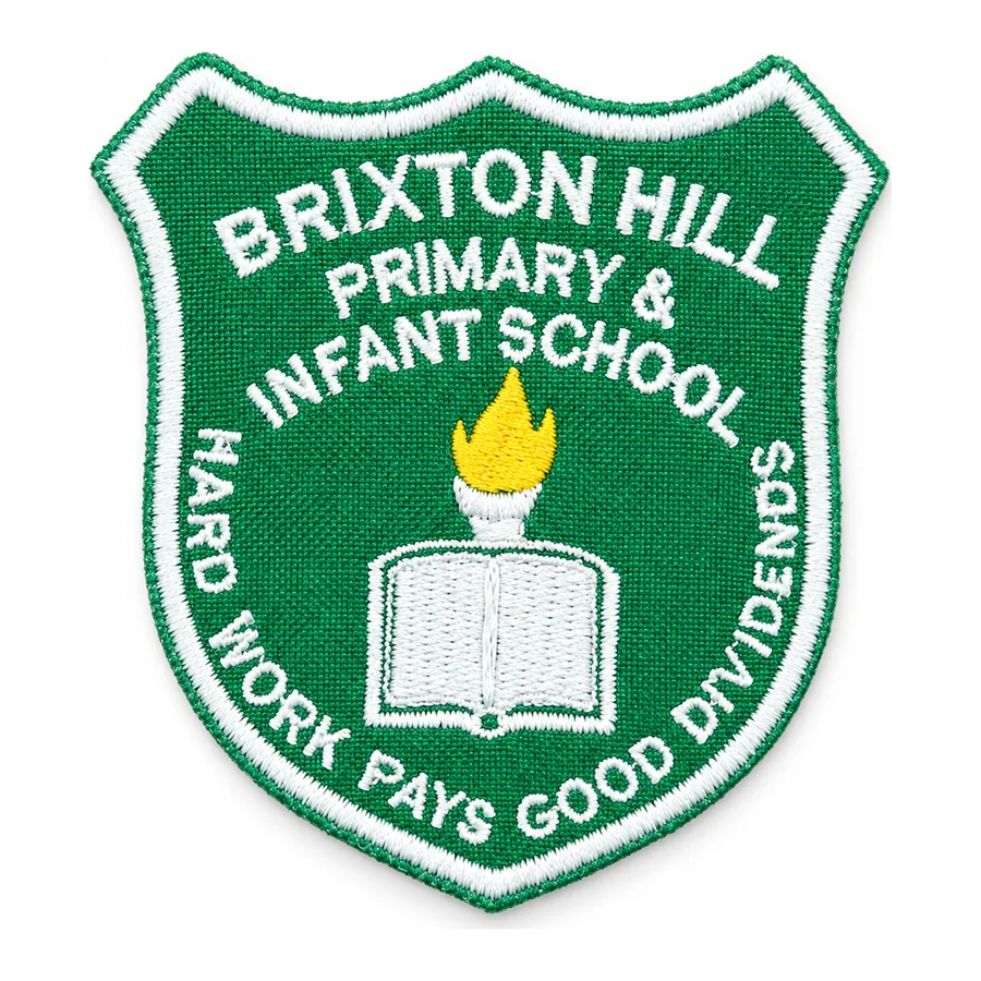 Green and white embroidered crest made by J&J United